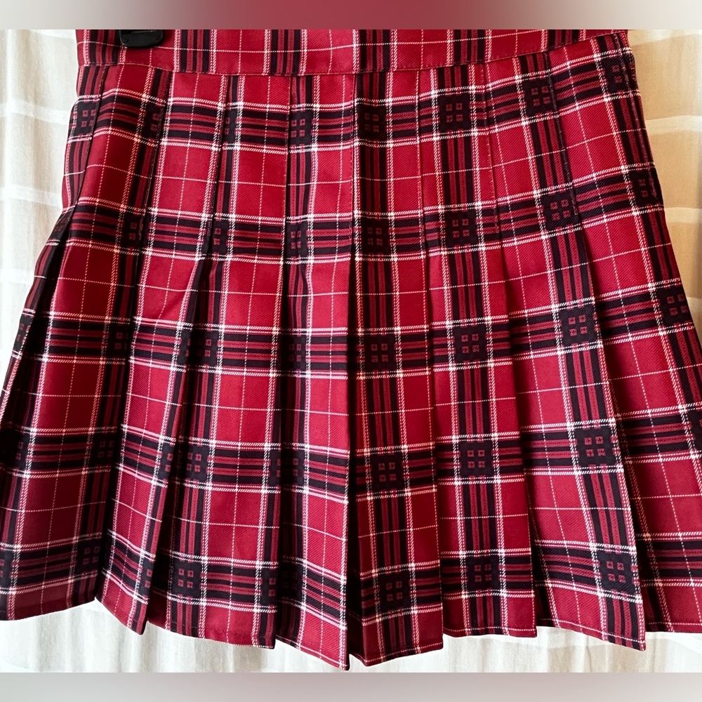 Red pleated skirt